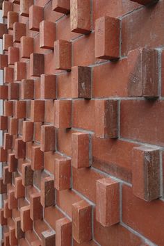 a red brick wall that is made out of bricks