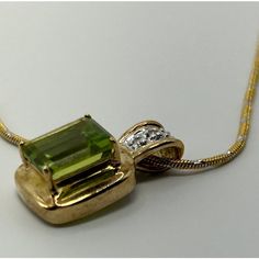 This is part of Chairish’s Fine Jewelry assortment.  14k Yellow Gold & Peridot Pendant & Necklace. Weight: 5 grams Weight of Chain: 3.2 grams Weight of Pendant: 1.8 grams  Chain Lth: 16 in.  Peridot: approx. 8.09 mm x 6.27 mm Peridot Necklace Pendant, Formal Peridot Jewelry For May Birthstone, Fine Jewelry Hallmarked Peridot, Gold Peridot Necklace For Formal Occasions, Gold Necklace With Peridot For Formal Occasions, Fine Jewelry Peridot For Formal Occasion, Formal Fine Jewelry With Peridot, Fine Jewelry In Gold With Peridot, Fine Jewelry Gold Peridot