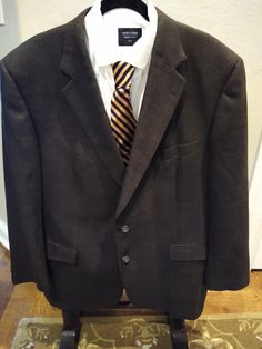 This is a vintage Burberry London Kensington Plaid 2 Button Blazer/Suit Jacket Sz 48R. Made in the USA of 80% wool and 20% silk and features notched lapels and double back vents. It has been gently worn and is in excellent condition. Measurements Length 32" Shoulders 21" Sleeves 24" plus 2" of extra material if alterations are required. Chest 48" Brown Blazer With Hidden Button For Business, Brown Blazer With Hidden Button Closure For Business, Classic Formal Button-up Blazer, Wool Button-up Suit For Business, Brown Button-up Blazer For Semi-formal Occasions, Classic Formal Button-up Sport Coat, Formal Wool Button-up Suits, Formal Wool Sport Coat With Buttons, Formal Brown Sport Coat With Lapel Collar