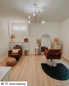 a living room filled with furniture and wooden floors