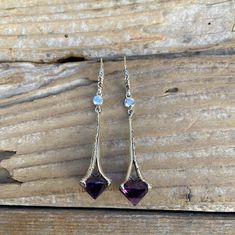 "Beautiful deep purple amethyst earrings 2 1/4\" tall with ear wires by 9/16\" wide at the widest spot, handmade in sterling silver 925 with 12mm gorgeous round Madeira citrine stones and 3mm round cubic zirconia (cz) stones...these are gorgeous earrings!" Purple Gemstone Accented Drop Earrings, Purple Drop Earrings With Gemstone Accents, Purple Long Drop Earrings With Ear Wire, Purple Amethyst Jewelry For Pierced Ears, Purple Amethyst Earrings For Pierced Ears, Nickel-free Purple Crystal Earrings In Sterling Silver, Purple Gemstone Accented Dangle Earrings, Purple Amethyst Jewelry With Ear Wire, Purple Gemstone Dangle Earrings