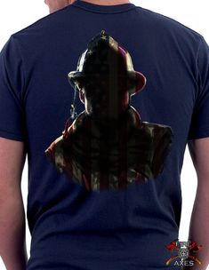 a man wearing a t - shirt with the image of abraham lincoln on it's back