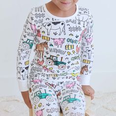 Make your little one's most colorful dreams come to life in these colorable pajamas! Made from our signature bamboo fabric, your kiddos will stay cool and comfortable all while making these PJs creatively their own. Use skin-safe, non-toxic fabric markers to keep your child's sensitive skin protected, all while keeping their masterpiece intact with no color bleeding after washes. Give your kids hours of fun that will not only add some magic into their bedtime routine, but serve as the coziest keepsake for years to come! MARKERS ARE NOT INCLUDED - MUST USE FABRIC MARKERS *PATENT PENDING For Best Results: Place a piece of paper or cardboard underneath the drawing area to prevent bleed through. Wait 24 hours to wash (the color may bleed in first wash, so wash separately.) Fabric markers requi Barnyard Bash, Baby Bundles, Fabric Markers, Bedtime Routine, Color Care, Bamboo Fabric, Pyjama Set, Kids Pajamas, Personalised Kids