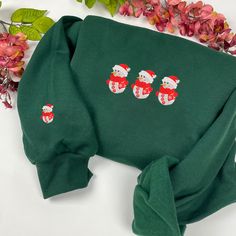 Introducing our Snowman Christmas Embroidered Sweatshirt, the perfect addition to your festive wardrobe! Made with high-quality materials, this cozy sweatshirt Hawaiian Shirt Women, Holiday Apparel, Women Sweatshirt, Embroidered Crewneck, The Snowman, Sweatshirt For Men, Christmas Couple, Embroidered Sweatshirt, Snowman Christmas