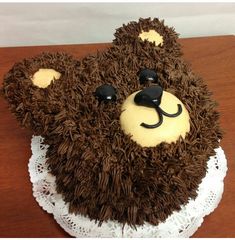 a cake shaped like a bear on top of a table