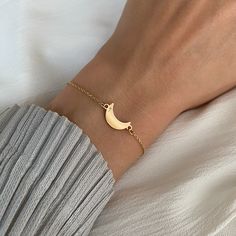 Moon Bracelet Gold Charm on Gold chain for Women 14K Gold Crescent Moon by Negru Jewelry online store Dainty Moon Shaped Bracelets As Gift, Elegant Gold Bracelets With Moon Phase, Elegant Gold Moon Phase Bracelets, Elegant Everyday Bracelets With Moon Charm, Adjustable Gold Moon Bracelets, Gold Moon-shaped Bracelets As Gift, Gold Moon-shaped Bracelets For Gifts, Gold Moon-shaped Bracelet For Gift, Minimalist Bracelet With Moon Charm As Gift