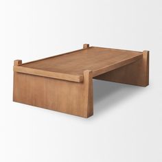 a wooden coffee table with one drawer open