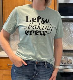 Love baking Lefse for the holidays? Get a shirt for your Lefse Baking Crew! This super soft Bella + Canva shirt makes a great gift or just a fun shirt to wear when you make lefse. A great gift for the Norwegian in your life! Funny Print Shirt With Relaxed Fit As Gift, Relaxed Fit Shirt With Funny Print For Gift, Relaxed Fit Shirt With Funny Print As Gift, Relaxed Fit Screen Print Top As Gift, Pre-shrunk Crew Neck Shirt As Gift, Graphic Tee Shirt With Relaxed Fit As Gift, Funny Text Crew Neck Shirt For Gift, Relaxed Fit Shirt With Funny Text For Gift, Fun Shirt