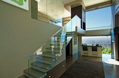 Luxury LA home atrium art gallery & floating stairs. Inspiring Outdoor Spaces, Stair Ideas, Interior Design News