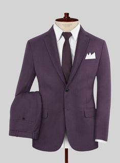 Luxury with a leisure aesthetic takes shape for the perfect man who wants to stand out on every occasion. Crafted with wool, micro fibre, lycra, our Napolean Stretch Purple Wool Suit has a bright purple color with a smooth texture and can be worn on chilly days to keep you warm and help you to look dapper at the same time.  Look Includes  Napolean Stretch Purple Wool Fabric  Two Button Jacket Style  Notch Lapel  Horn Royal Black Buttons  Single Vent  Three Cuff Buttons  Two Welted Back Pockets on Trousers   Click 'Customize Now' to modify the look if needed.  Lining: Viscose; Dry Clean. Purple Single Breasted Suits For Business, Tailored Purple Business Suit, Purple Tailored Suit With Notch Lapel, Leisure Aesthetic, Classic Purple Notch Lapel Suit, Tailored Single-breasted Purple Suits, The Perfect Man, Button Jacket, Looking Dapper