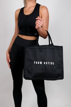 Your new go-to bag for literally everything. Our FORM Tote Bag fits everything & more and is perfect for day to day use, whether its going to the gym, work, shopping or even a weekend away. Wear it your way with two handle options - super cute & sturdy short loops or attach the shoulder strap for an on the shoulder vibe. Large sized tote bag 41w x 35h x 18d (cm) Structured feel, easy to wipe over with a wet cloth for cleaning Sporty luxe look with a slight sheen finish Strong, structured short h Functional On-the-go Tote Bag, Sporty On-the-go Shoulder Gym Bag, Functional Tote Travel Bag For Daily Use, Functional Bag With Adjustable Handle For On-the-go, Versatile Tote Gym Bag For Daily Use, Sporty Double Handle Gym Bag For On-the-go, On-the-go Gym Tote Bag With Top Carry Handle, Functional Tote Bag For On-the-go, On-the-go Tote Gym Bag With Top Carry Handle