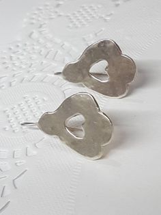 These romantic, vintage style heart earrings are part of a collection inspired by an old chair which belonged to my family. The drop silver heart earrings are available both in 14k gold plating (watch the short video to see them) or sterling silver and were 100% handmade with love. To see these earrings in 14k gold plating also follow the link: https://www.etsy.com/il-en/listing/726055763 Dimensions: Total drop is 1.5 inches. Earring across is 0.8 inches These beautiful 925 silver earrings are j Silver Dainty Heart Earrings For Wedding, Handmade Silver Heart Drop Earrings, Vintage Silver Nickel-free Heart Earrings, Sterling Silver Heart Earrings With Ear Wire For Wedding, Vintage Style Nickel-free Silver Heart Earrings, Handmade Sterling Silver Heart Earrings, Elegant Handmade Sterling Silver Heart Earrings, Vintage Silver Heart Earrings For Anniversary, Vintage Style Sterling Silver Pierced Heart Earrings