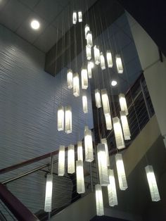 a chandelier hanging from the ceiling in a building