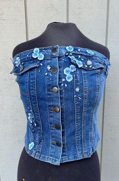 Women's XL, can be made in other sizes and flower colors. Measurements available upon request Casual Fitted Vest With Floral Embroidery, Fitted Floral Summer Tops, Fitted Floral Embellished Summer Tops, Fitted Floral Embellished Tops For Summer, Fitted Floral Embroidery Tank Top For Spring, Painted Clothes Diy, Upcycled Jeans, Flower Colors, Upcycle Jeans