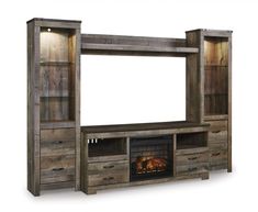 a large entertainment center with fireplace and shelves