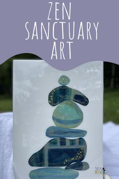 a glass block with the words zen sanctuary art in front of it and an image of a