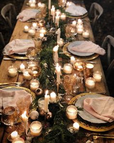 a long table with candles and plates on it is set up for an instagram