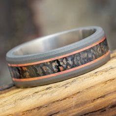 Dinosaur Bone Ring with Copper Pinstripes and Rugged Titanium Engraving Fonts, Dinosaur Bones, Band Jewelry, Unique Wedding Bands, Titanium Rings, Ring Sizer, Engraved Rings, Mens Wedding Bands, Wedding Men