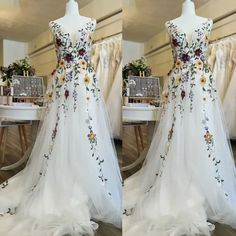 two pictures of a wedding dress with flowers on the front and back, in different angles