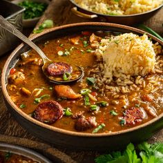 a close up of a bowl of food with rice and beans on the table next to other dishes