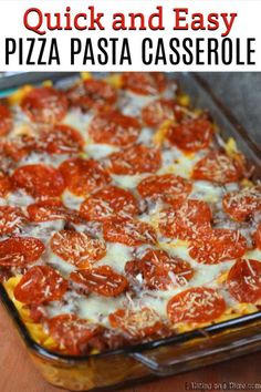 a pizza casserole with cheese and tomatoes on it in a glass baking dish