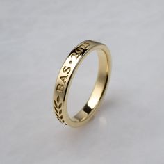 Have your degree or diploma abbreviation , graduation year and school letters cast right into a solid gold ring. For those who who would prefer a smaller ring to commemorate their graduation instead of the more common signet ring. Features of the ring:    -Font is Times New Roman   - Characters are cast into the ring to a depth 1/5 the thickness of the ring, making them easy to read   - The characters have a sandblasted finish. The rest of the ring is highly polished    -Band is 3mm wide and 1.5 Classic Engraved Ring Stamped 14k For Commemoration, Classic 14k Gold Engraved Ring For Commemoration, Classic Personalized Engraved Ring For Commemoration, Class Ring Ideas, Cute Class Rings, 14k Gold Engraved Ring With Hallmarks For Commemoration, Personalized Classic Engraved Ring For Commemoration, Personalized Gold Rings For Commemoration, Graduation Rings High School