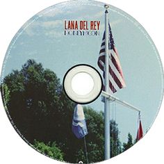 the cd cover for lana del rey's songbook, flag on pole with american flag in foreground