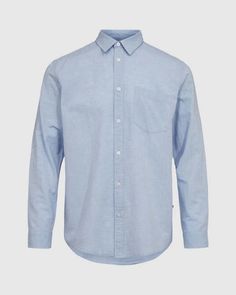 A long sleeved shirt crafted from organic cotton and linen for a leight and comfortable quality. the shirt has a relaxed fit and features a collar button closure a chest pocket and cuffs.    68% organic cotton 32% linen Long Sleeved Shirt, Mens Button Up, Designer Clothes For Men, Chest Pocket, Hydrangea, Long Sleeve Shirts, Organic Cotton, Relaxed Fit, Collar