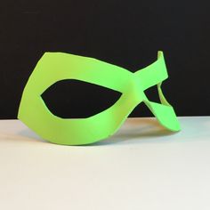 Neon green superhero mask in genuine leather.  ANY COLOR AVAILABLE  For Comicon costume or villian / super hero costume, Halloween, Mardis Gras, Masquerade, or Renaissance Faire!  ♦ COMFORTABLE & ADJUSTABLE ♦ Secured with or without ties for adjustability, supple leather is formed to facial contours.  SHOWN IN GLOSSY (Matte available by request.) ORDER ANY COLOR ♦  Match your costume, Free! -- Professionally airbrushed & hand-painted. -- Scroll to end of listing for links to other colors ☺ ♦  Cu Green Halloween Costume Party Mask, Green Halloween Cosplay Mask, Superhero Masks For Cosplay Events, Superhero Masks For Halloween Masquerade, Superhero Style Masquerade Masks For Halloween, Superhero Masquerade Mask, Comicon Costume, Green Superhero, Festival Mask