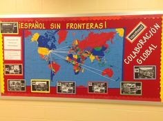 a bulletin board with an image of the world in spanish and other countries on it