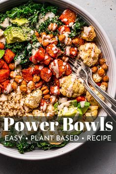 a bowl filled with cauliflower, broccoli and chickpeas next to a fork