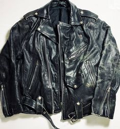 A rare and perfectly worn 1980's Leather Biker Jacket Size Large/X-Large Wear: Good vintage condition. Pit to pit: 22 Inch Collar to hem (on back of item): 26 Inch (All international orders are shipped as low value/gift) Vintage Distressed Biker Jacket, Distressed Vintage Biker Jacket, Distressed Vintage Biker Jacket For Fall, Vintage Distressed Biker Jacket For Biker Events, Grunge Leather Jacket For Biker Events, Vintage Leather Jacket For Motorcycling In Fall, Vintage Biker Jacket For Fall Motorcycling, Vintage Biker Jacket For Motorcycling In Fall, Vintage Fall Biker Jacket For Motorcycling