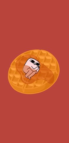 a cartoon character sitting on top of a waffle