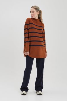 Our favorite sweater of the season, the Sarabeth is knitted in a super chic rust / navy stripe that pairs back perfectly to our Seamless legging or BFF denim. Made in our recycled fabric, this sweater has hidden zippers for easy nursing access. NOM is designed and built to last during, for nursing + after. FREE shipping and returns on all US orders CARE + DETAILSMachine wash. Lay flat to dry.33% Nylon 28% Recycled Polyester 19% Acrylic 16% PBT 4% Wool FIT + SIZE GUIDEFits true to size26.5" Nursing Sweater, Maternity Brands, Nursing Hoodie, Baby Wrap Carrier, Sleep And Loungewear, Nursing Tops, Maternity Sweater, Favorite Sweater, Seamless Leggings