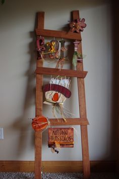 a wooden ladder with some items on it