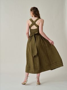 "Summer calls for a crisp dress and this cross-back dress from Linennaive is pretty perfect.  Made from breezy linen, it has comfortable cross back that'll really let skin breathe. Featuring a a classic square neckline and pleated detailing, evoking the laidback rhythms of far-off islands and unexplored landscapes.  It enhance the grace and femininity with a whimsical and flattering flow.  PS: It show very gorgeous and rich colors in sunlight for a truly one-of-a-kind, sophisticated allure. 【Fabric】 100% Linen, around 200g/gram. Medium weight. Every year we have a dedicated team to study the evolution of linen. Linen is a traditional fabric. It seems that linen will not change even if dynasties have changed, and time has passed. Let us add a little imagination and curiosity here. If the ra Green Midi Dress With Tie Back, Green Midi-length Dress With Tie Back, Tie-back Midi Dresses For Garden Party, Midi Length Tie Back Dress For Garden Party, Tie Back Midi Dress For Garden Party, Spring Tie Back Cross Back Dress, Knee-length Midi Dress With Tie Back For Garden Party, Knee-length Tie Back Midi Dress For Garden Party, Elegant Maxi Dress For Picnic