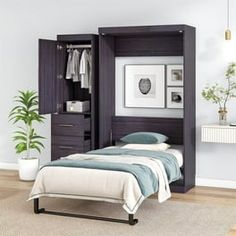 a bed sitting in a bedroom next to a closet