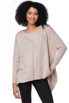 Crafted from luxurious 100% featherweight cashmere, this top-selling favorite has been a customer go-to for over a decade. With its relaxed, easy fit and ribbed details at the neck, cuffs, and hem, it offers timeless style and comfort. The side slits add effortless movement, making it perfect for layering or wearing on its own. A true wardrobe staple, this sweater continues to be a bestseller year after year. Subtle Luxury 100% California Cashmere Easy Fit Hand Wash Cold or Dry Clean Imported Winter Wrap, Subtle Luxury, Sweater Scarf, Luxury Scarves, Scarf Sale, Shirt Embroidery, St Barth, Wrap Cardigan, Poncho Sweater