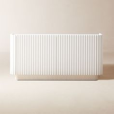 a white radiator sitting on top of a table