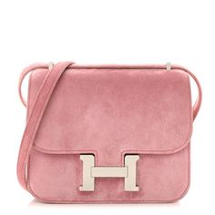 This is an authentic HERMES Veau Doblis Constance 18 in Rose Indienne. This classic bag is finely crafted of Veau Doblis suede leather in pink with a matching shoulder strap. The top flap opens with a palladium H clasp to a partitioned pink leather interior with patch pockets. Luxury Shoulder Bag With Suede Lining, Luxury Formal Bag With Suede Lining, Bri Aesthetic, Hermes Constance Bag, Dream Bag, Love Luxury, Hermes Constance, Classic Bags, Pretty Bags