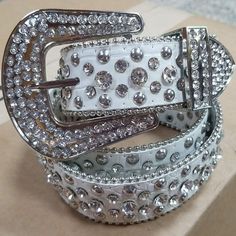 Please allow some extra handling time as stated in the shipping details while these are being made. Thank you. Women's Fashion Belts Western Rhinestone Bling Belts Sizes Small, Medium, Large and Extra Large Faux Leather with Rhinestone Design Rodeos, Cowgirl, Fairs, Parties and Events Western Fashion Rhinestone Belts Brand New, Made to Order SHIPPING FROM PENNSYLVANIA Size S: 105cm Size M: 115cm Size L: 125cm Size XL: 135cm 3.8cm Wide Rhinestones, Sparkle and Bling! Women's Cowgirl Belts Luxury Belts Western, Rhinestone Belts, Cowgirl Belts, Bling Belts, Cowgirl Bling, Stud Fashion, Rhinestone Belt, Western Belts, Fashion Belts