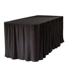 a black table cloth with pleated edges