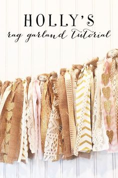 the words holly's rag garlands are lined up on a white wall with gold foil