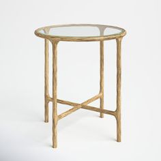 a glass and wood side table on a white background with the top half turned upside down