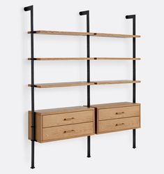 a book shelf with two drawers and black metal handles