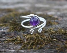 Amethyst Simple Wire Wrapped Ring Adjustable Ring | Etsy Silversmithing Jewelry, Wire Jewelry Rings, Amethyst Birthstone, Diy Bijoux, Wire Wrapped Ring, Fidget Rings, Chakra Jewelry, Rose Quartz Ring, Wire Wrapped Rings