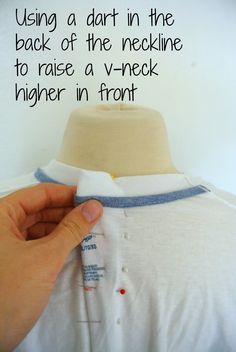 a person holding onto a white shirt with the words using a dart in the back of the neckline to raise a v - neck higher in front