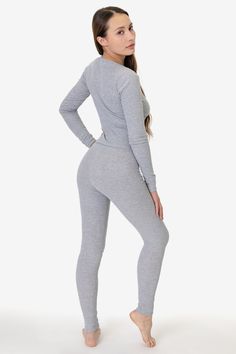 This thermal legging is an essential layering piece for the winter. Made of our 50/50 poly cotton waffle knit that keeps you comfortably warm and cozy. Features a 1" elastic waistband, ribbed ankle cuffs and finished with durable flatlock seams. Try pairing with our matching T3007 Baby Thermal Top for a cute sleep or loungewear look. Runs slightly small, we recommend sizing up if you are in-between sizes. Made in Los Angeles, Calif. Our experienced sewers earn up to $25 an hour and no less than Lace Knitwear, Cute Sleep, Women In White, Denim Short Jumpsuit, Kids Garments, Denim Workwear, Thermal Leggings, Sweater Jumpsuit, Denim Sweater