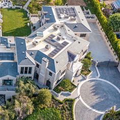 an aerial view of a large house with lots of windows