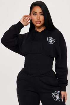 Available In Black. Hoodie With Drawstrings Long sleeve Corset Detail Las Vegas Raiders Graphic Self 60% Cotton 40% Polyester Lining 60% Cotton 40% Polyester Imported | Raiders Corset Hoodie in Black size 2X by Fashion Nova Sporty Drawstring Tops For Winter, Winter Streetwear Top With Drawstring, Drawstring Long Sleeve Sweatpants For Fall, Long Sleeve Drawstring Tops For Streetwear, Athleisure Drawstring Top For Winter, Athleisure Tops With Drawstring For Winter, Fitted Fall Hoodie With Drawstring, Fitted Long Sleeve Sweats For Winter, Winter Sweats With Drawstring